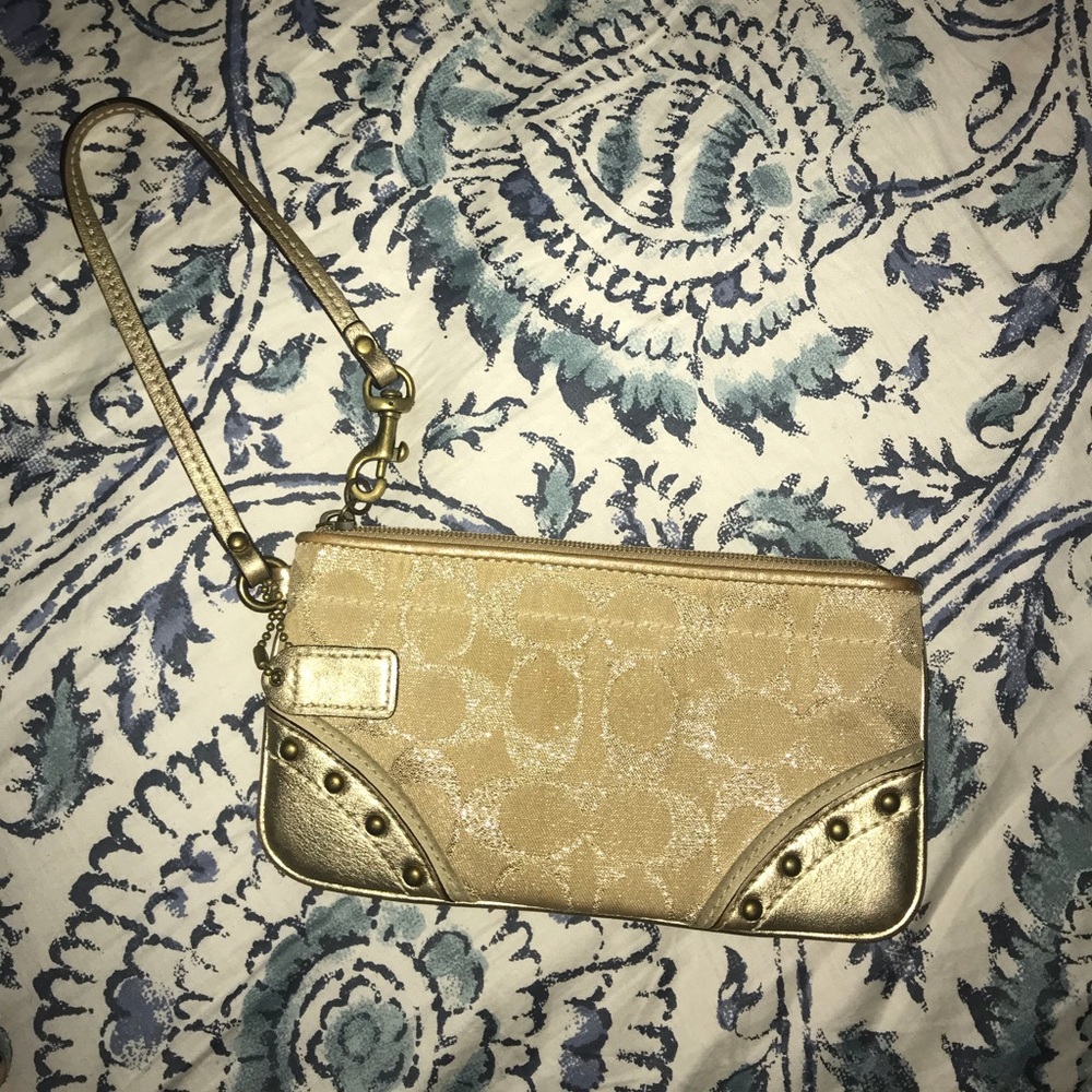 Coach gold studded wristlet